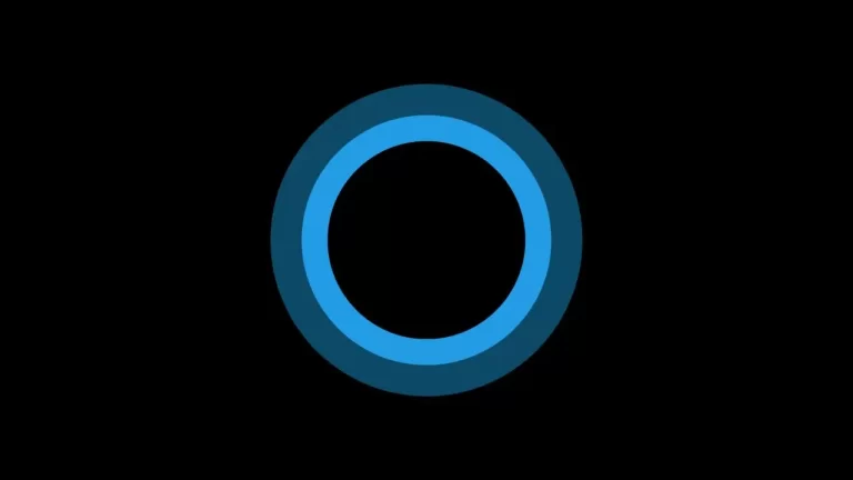Logotipo circular azul da Cortana sobre um fundo preto, representando a assistente virtual do Windows 10.