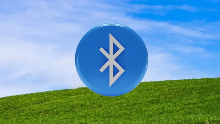 Ilustração com o ícone do Bluetooth sobre uma paisagem natural, representando a busca pela versão do hardware no Windows.