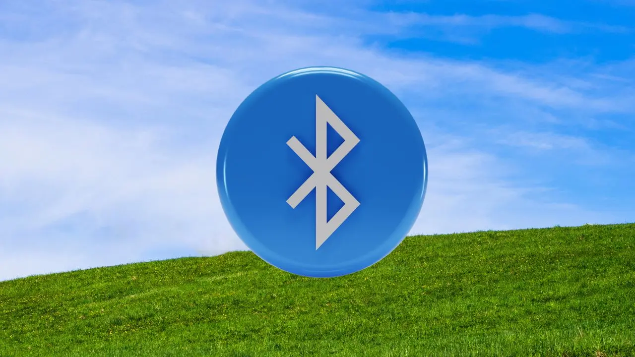 Ilustração com o ícone do Bluetooth sobre uma paisagem natural, representando a busca pela versão do hardware no Windows.