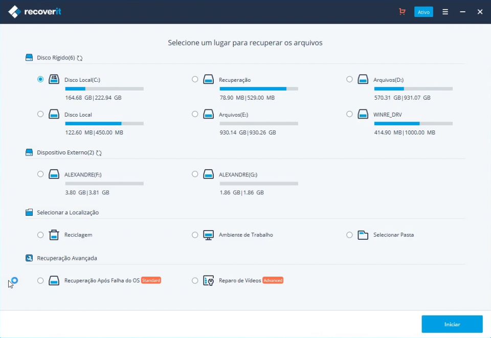 Captura de tela da interface principal do software Wondershare Recoverit em português, exibindo a seleção de discos rígidos, partições e dispositivos externos para iniciar a varredura de dados.