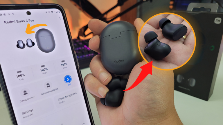Fones de ouvido Xiaomi Redmi Buds 3 Pro em sua caixa de carregamento.