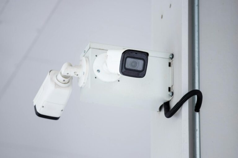mounted surveillance camera on the wall